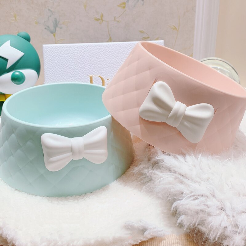 Large bowls with white bow in relief for food and water. Suitable bowls for dogs, cats and other pets.