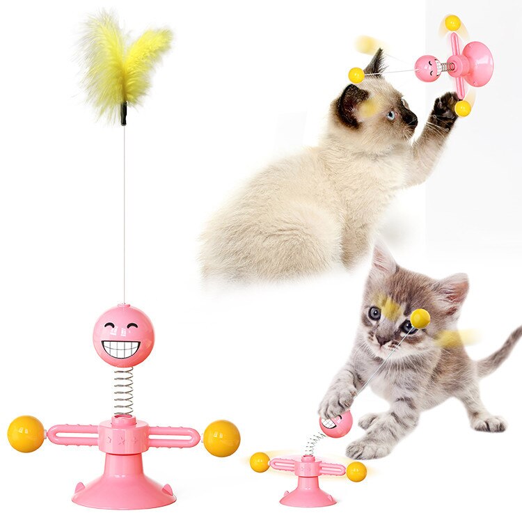 Interactive cat toy, rotating with feathers, crazy! Your cat won't think of anything else! Pink and yellow model shown and kittys are playing with it