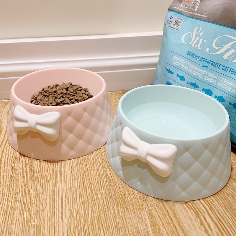 Large bowls with white bow in relief for food and water. Suitable bowls for dogs, cats and other pets.