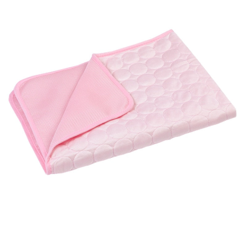 Cat or Dog Pets Cooling Mat - for hot summer days. A cat cooling mat can provide a number of benefits for cats on a hot day. Pink colour, folded